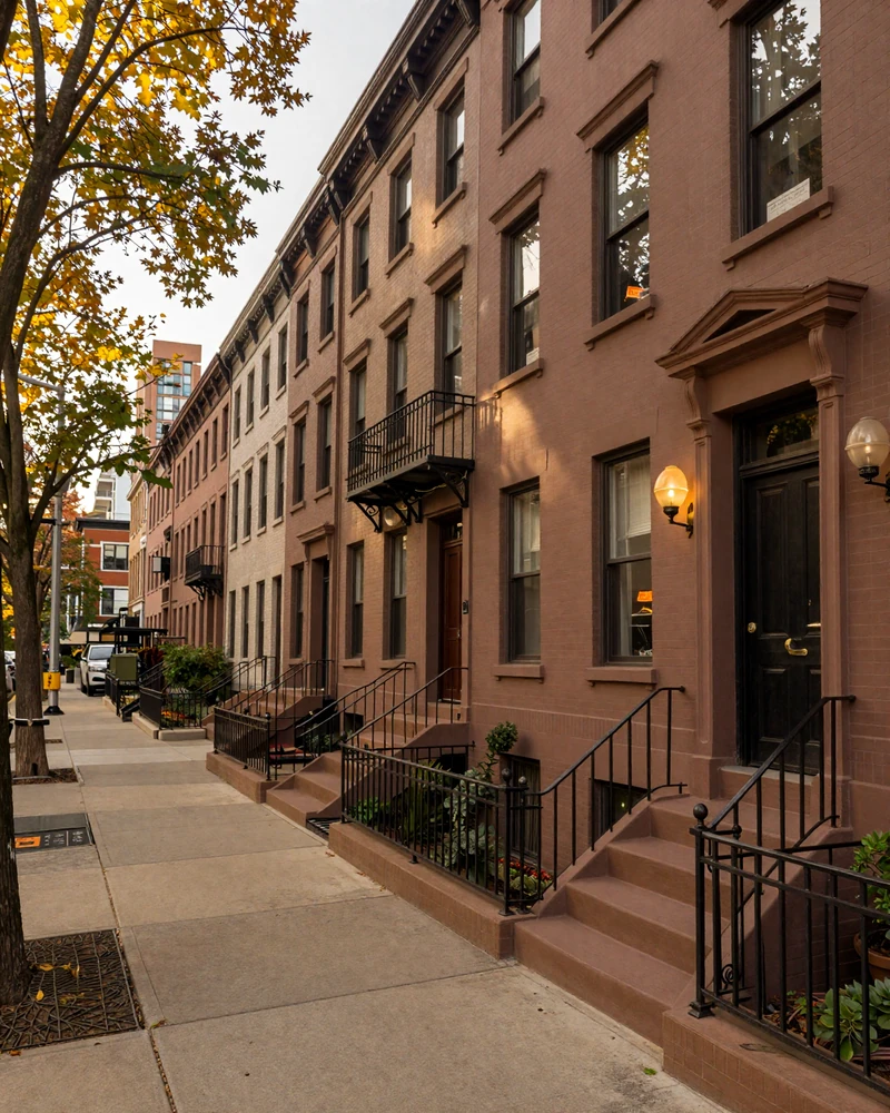 Chicago Gold Coast brownstone street at golden hour representing the sugar baby Chicago setting